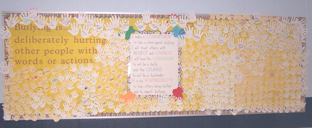 school bullying signs pledge wall